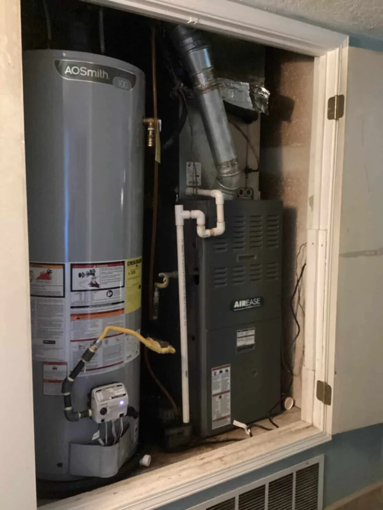 A water heater and furnace closet in a home