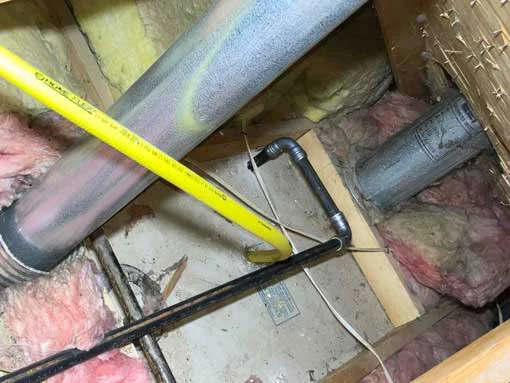 Completed gas line repipe installation in attic space in Los Lunas NM