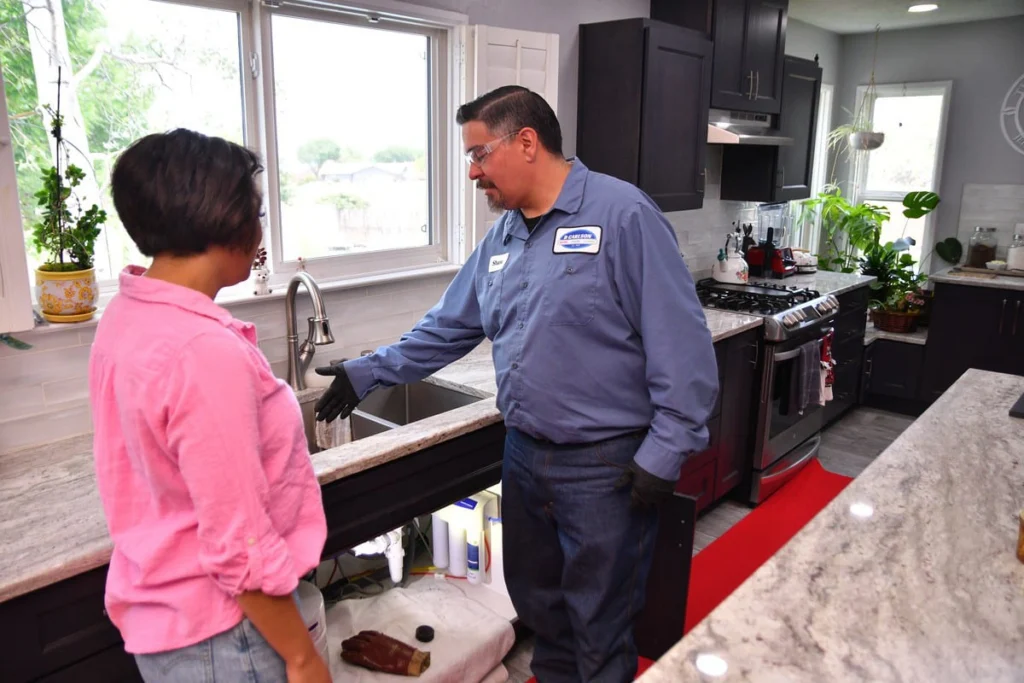 Plumber discussing sink installation in Albuquerque, NM