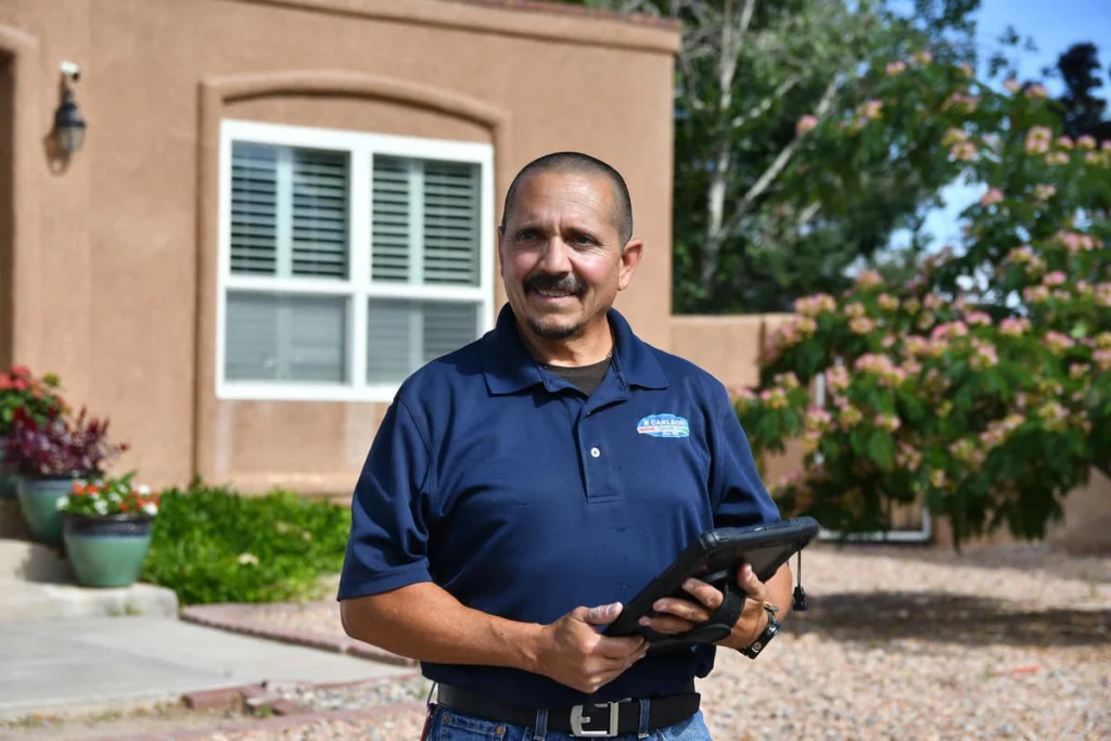 Professional service technician with tablet in Albuquerque, NM