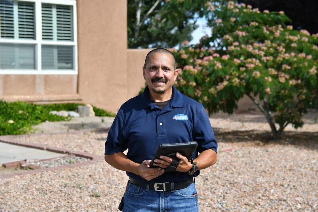 Service professional with tablet in home in Albuquerque, NM