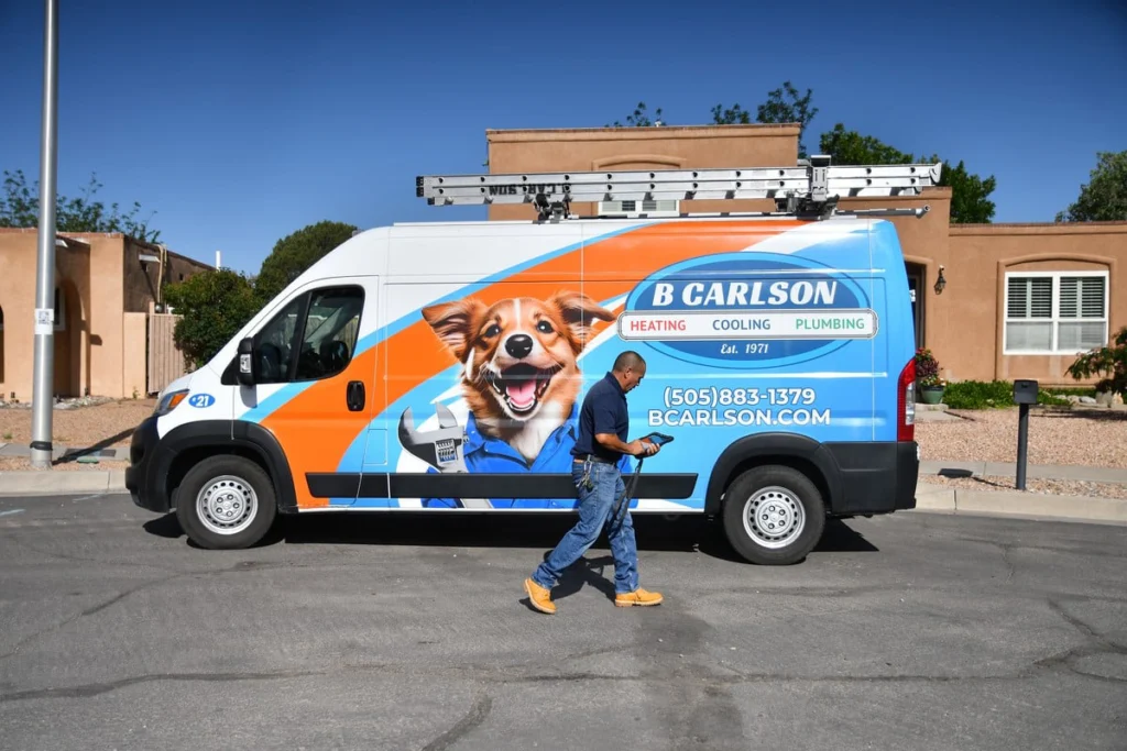 Service technician with branded HVAC van in Albuquerque, NM