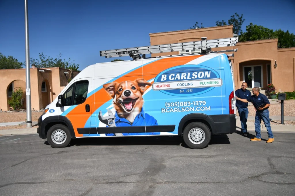 Service van with ladder rack and mascot in Albuquerque, NM
