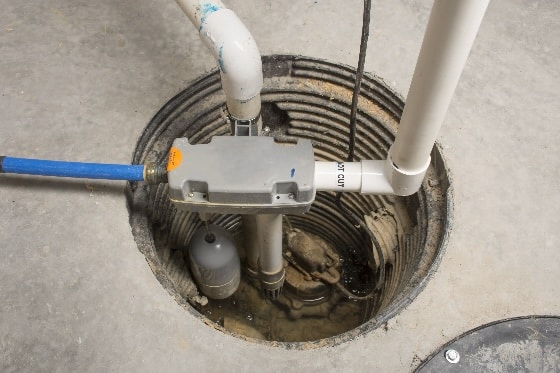 A sump pump in the ground.