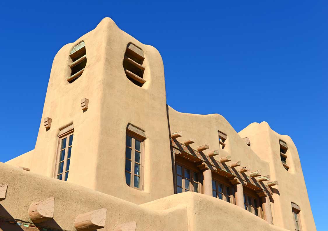 Traditional Pueblo style Adobe Architecture usually in earth tones, referred to as Old Santa Fe Style, characteristic of buildings in New Mexico, USA