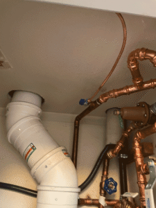 Gas line and venting connections for new furnace installation in Santa Fe