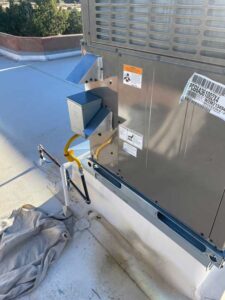 Details of the gas line connection to the rooftop HVAC system installed in NM