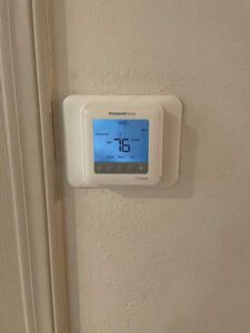 Honeywell thermostat installation during HVAC upgrade in Rio Rancho