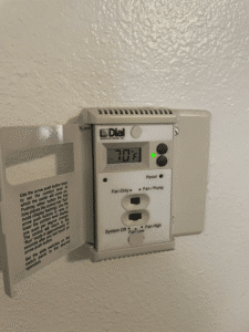 Evaporative cooler thermostat control installed inside Albuquerque home